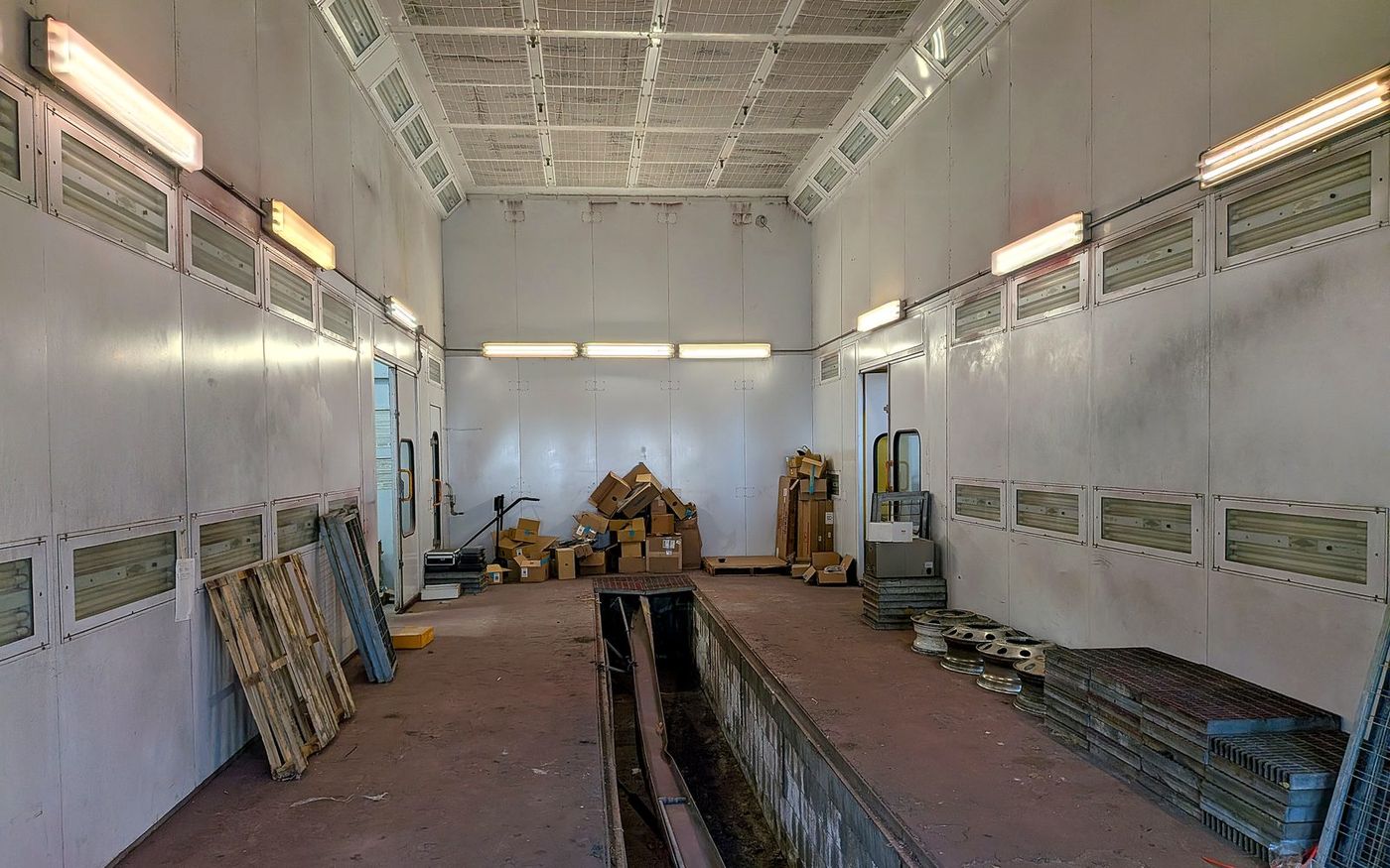 In-house paint booth with filtration walls